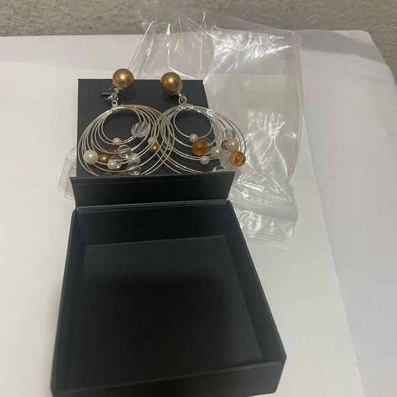 Subversive Silver Toned Hoop Earrings - Picture 3 of 8